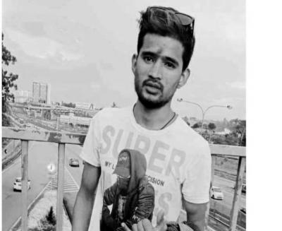 अ